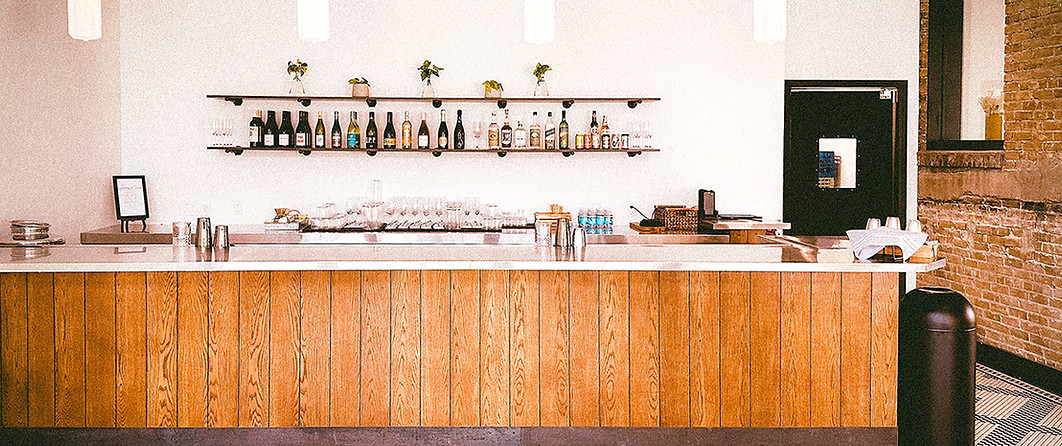 Parkside’s private event space with a private bar overlooking 6th street in downtown Austin