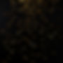 golden confetti dropping with a black background.jpg