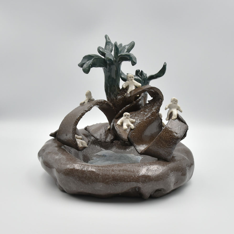 Fantaisie décorative en céramique artisanale. Ile imaginaire façonnée à Paris par ED Céramiste.