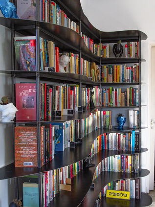 curvy modern metal black library design by Niv Shafran