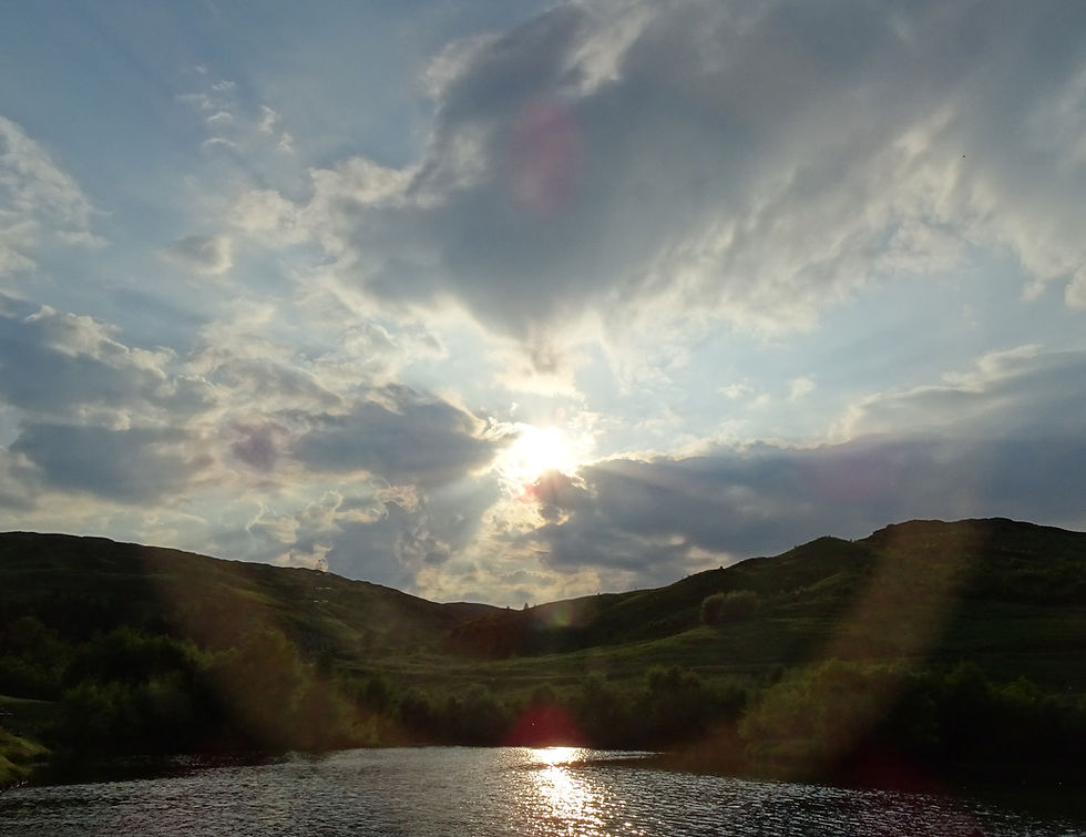 The Sun Bursting Through the Clouds at Glengoulandie, near Aberfeldy, Sco