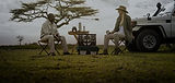 A Client with a guide during her Private Tanzania Safari_edited.jpg