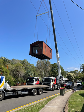 Modular Home being lifted on truck