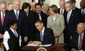 Barack Obama signs the ‘Obamacare’ healthcare bill in the East Room of the White House in Washington on 23 March 2010.