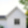 house with a small section of white siding on it.jpg