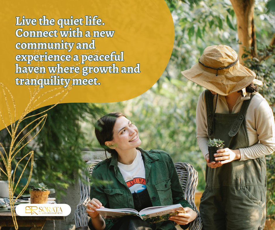 a woman is sitting in a chair reading a book