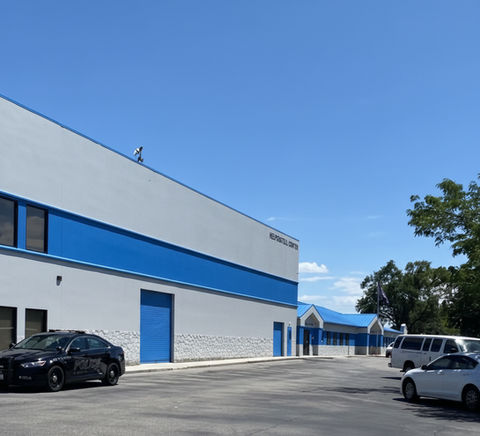 Exterior view of the building with the words,