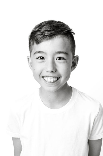 Black and white of boy smiling