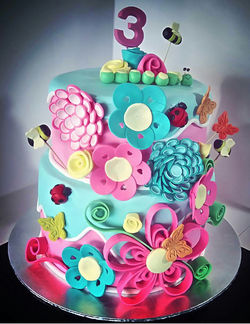 Whimsical Flower and Bug Cake