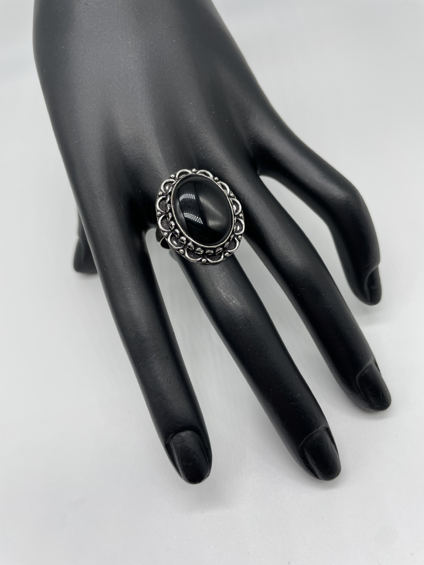 Black Onyx Oval Ring in beautiful decorative setting.