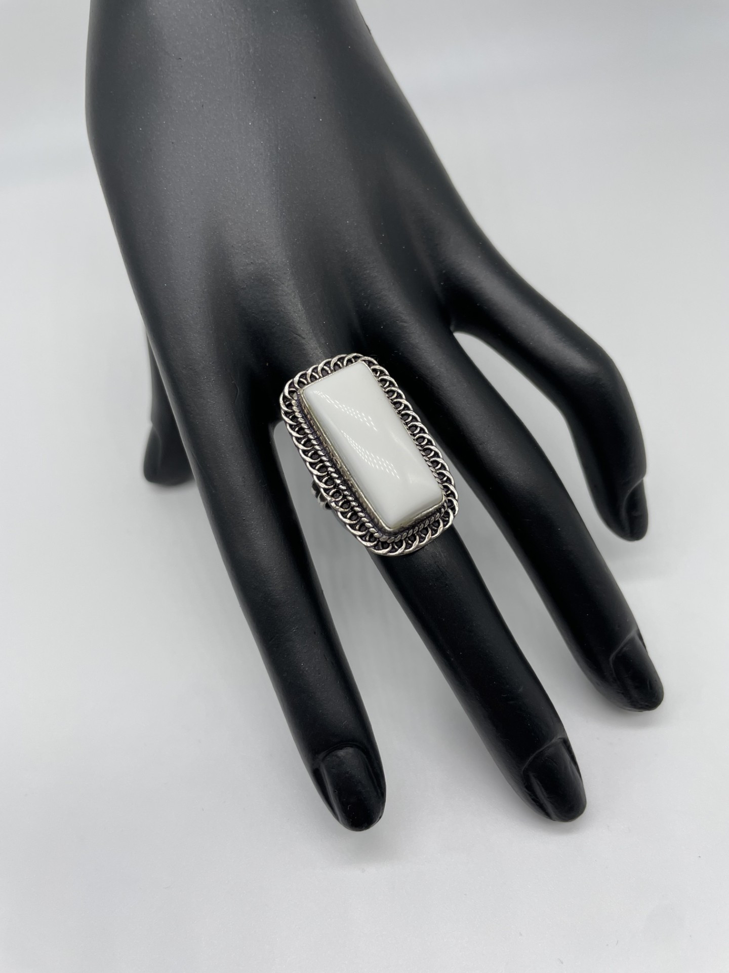 Large rectangular ring with decorative border. The White Jasper gemstone means it will complement any outfit.