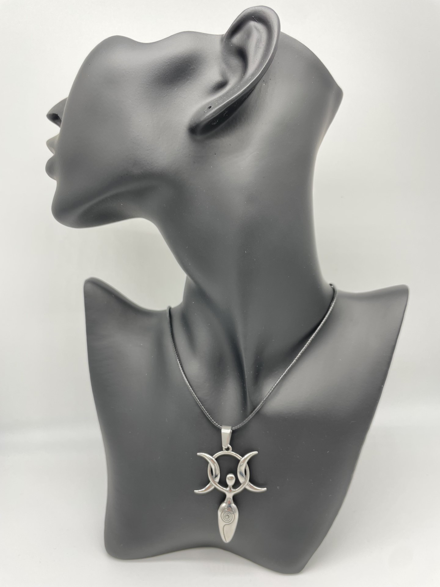 Stainless steel pendant featuring Goddess with triple moon design.
