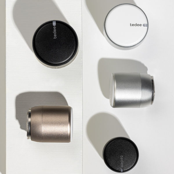 Tedee smart lock models with a round cylinder design, shown from above on a light background