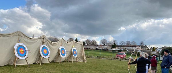 image shows people shooting