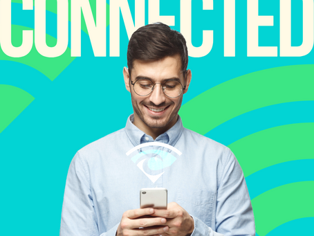 man connected to wifi on cell phone