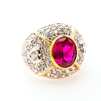 luxurious-golden-ring-with-purple-gemstone.jpg