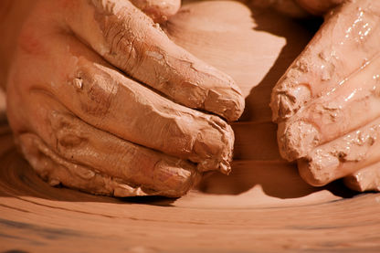 MEN IN THE POTTERS HANDS