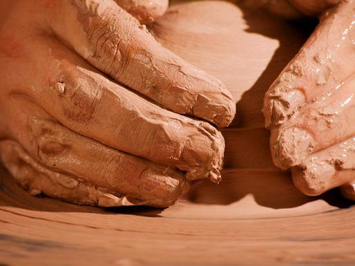 MEN IN THE POTTERS HANDS
