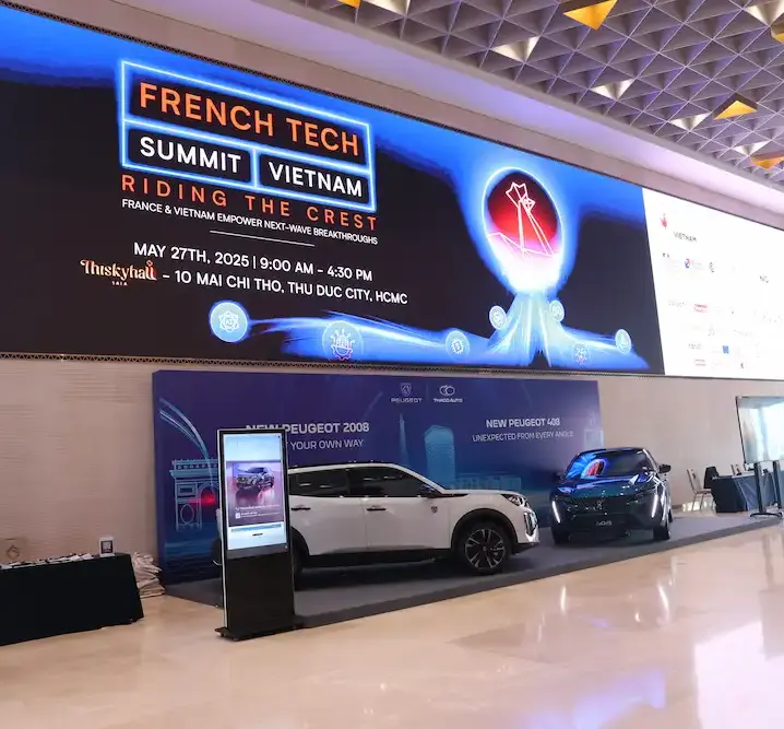 French Tech Summit Vietnam event display with cars