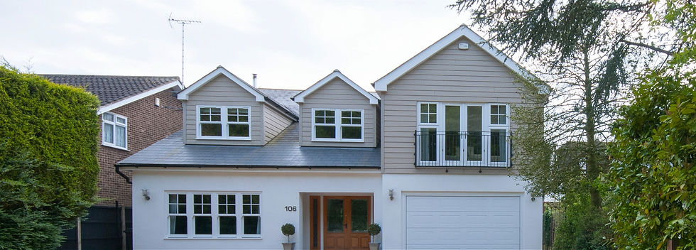 General exterior front view of a house with cladding