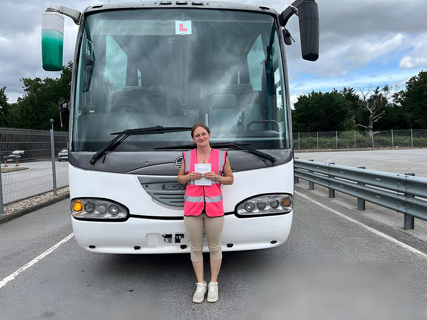 Driver looks confident after professional driver training completion.