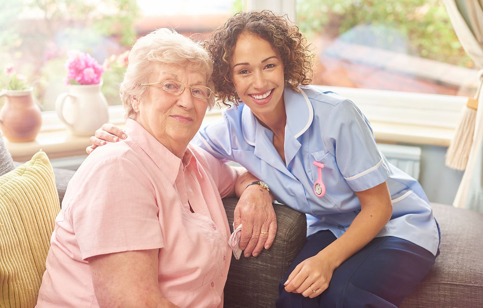 A senior woman in her home with her home carer