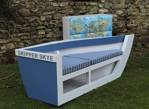 Custom boat shaped garden benches with blue and white striped seating