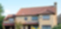 Stone house protected with comprehensive exterior maintenance services.
