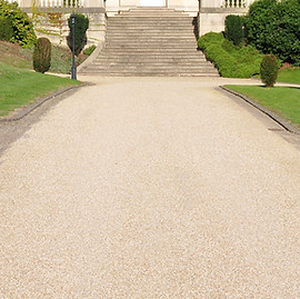 Resin driveway leading to a beautiful house