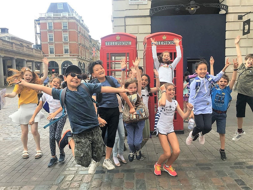 Students at SKOLA English Summer School London jumping in Covent Garden