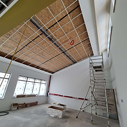 Forming Margins + slope grid ceiling installation