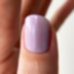 Thumbnail: Nails with Soft Focus Basecoat in Lavender Ice, a purple base coat. 