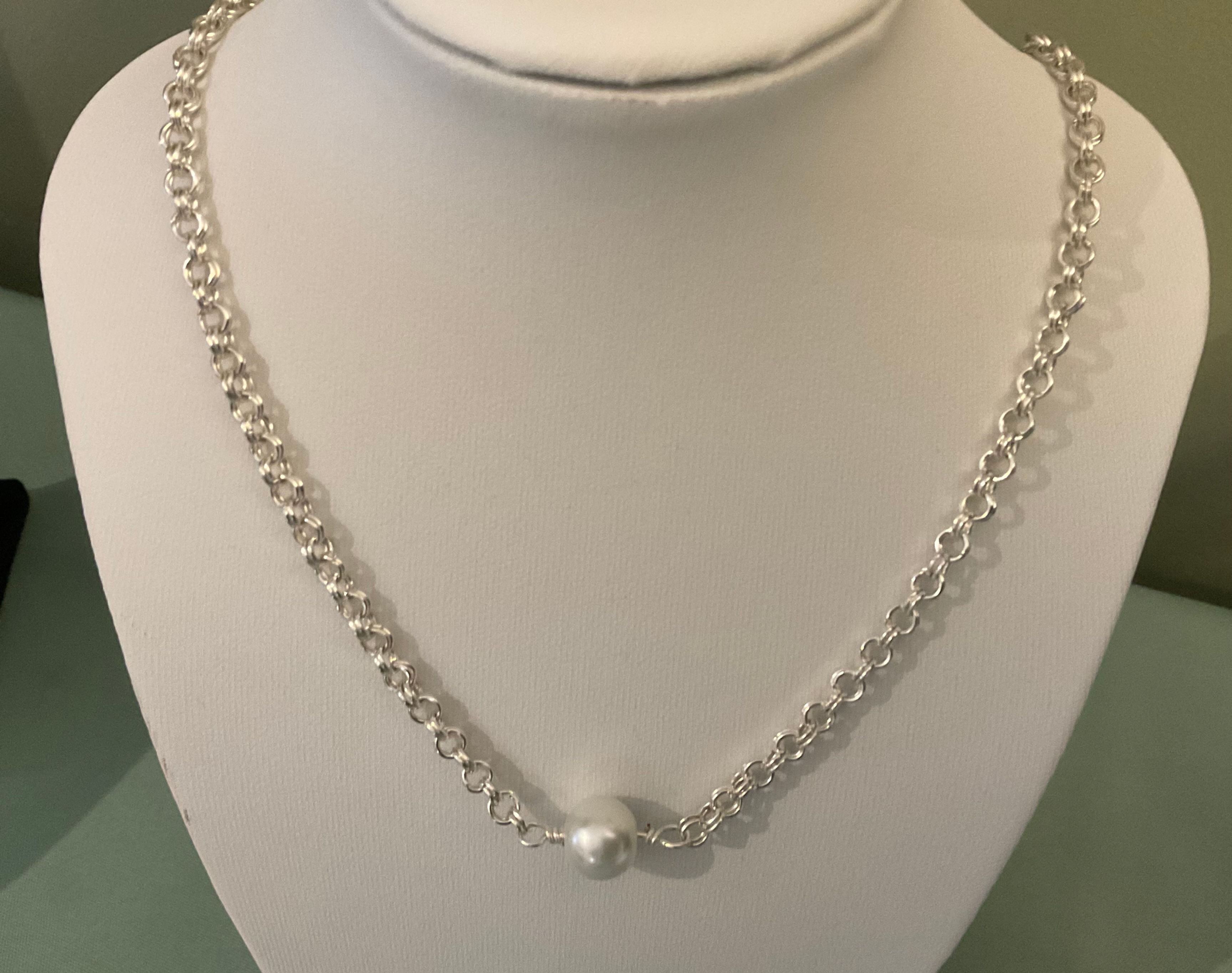 Necklace handmade of a single large pearl on a silver double-ring chain from WildGeraniumJewelry.com