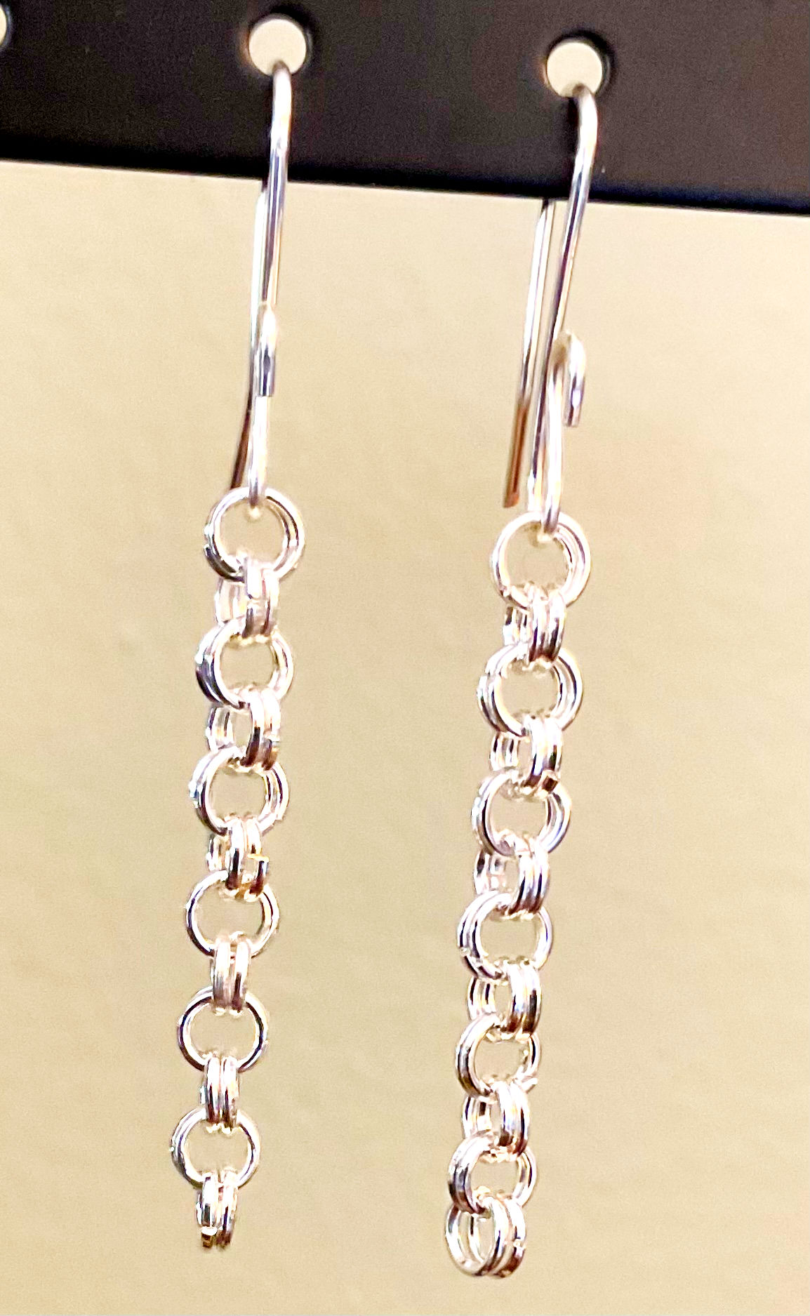 Handcrafted double-ring earrings in silver from Wild Geranium Jewelry.