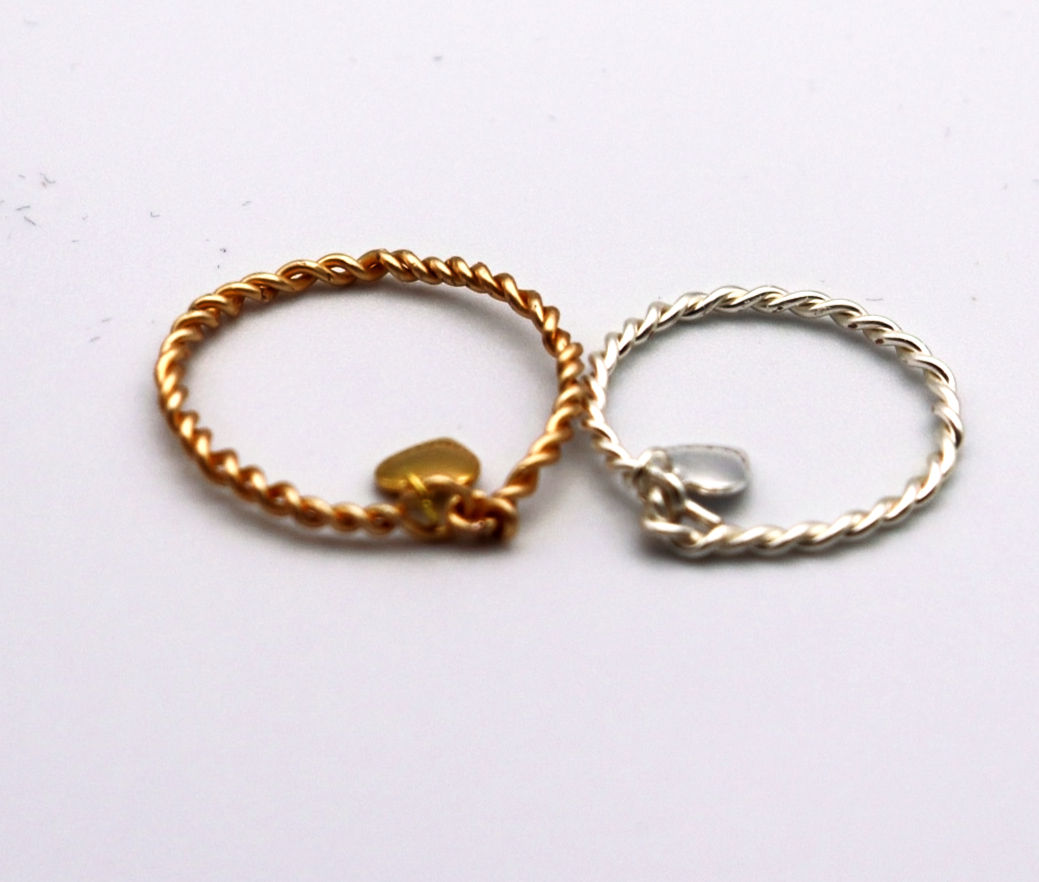 Silver and Gold rings made of twisted wire with a tiny heart from WildGeraniumJewelry