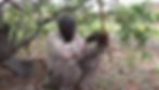 Ruben Sauneib Sanib, at the spring Sanibe||gams associated with his father, demonstrates how once he hunted with bow and arrow (photo: Sian Sullivan, 100315)