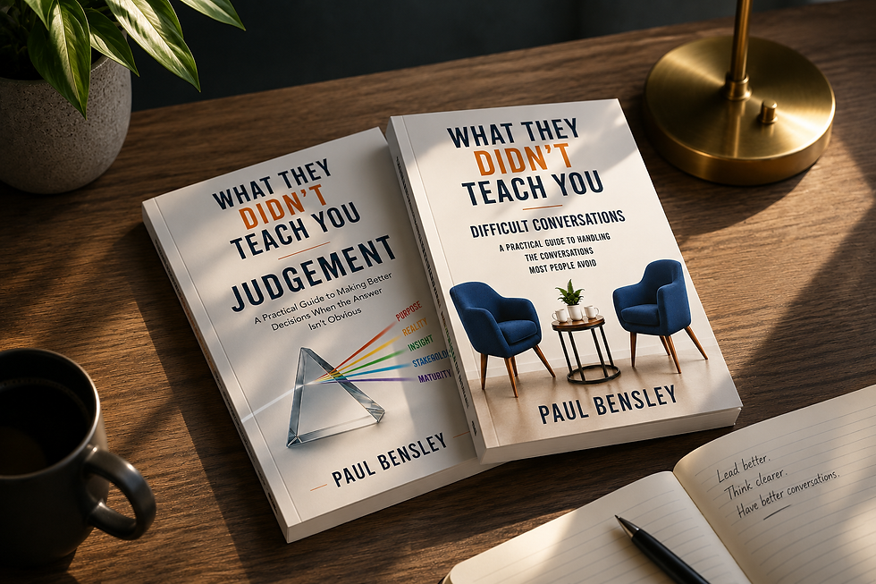 Paul Bensley's leadership development books on a desk.