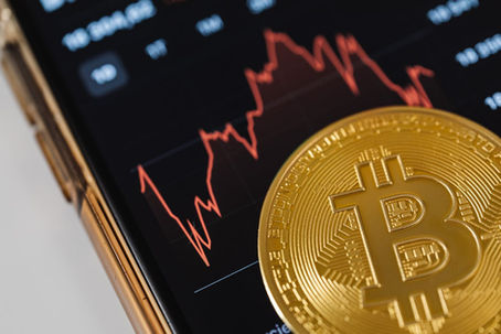 Bitcoin coin representing cryptocurrency market dynamics.