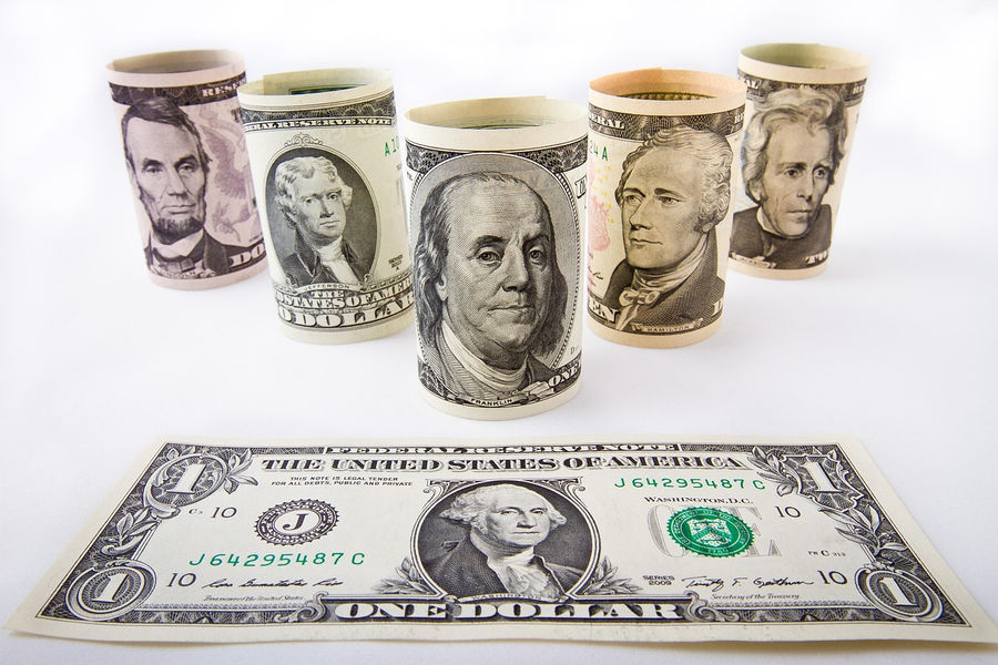 US dollar bills symbolizing Federal Reserve policy.