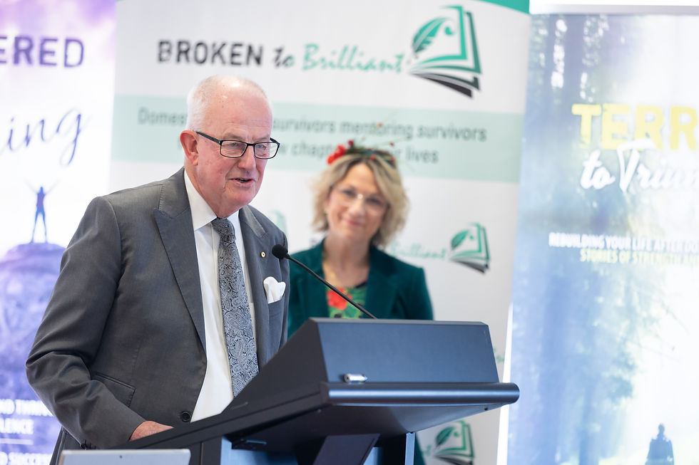 A photo of Patron Bob Atkinson and emcee Loretta Ryan