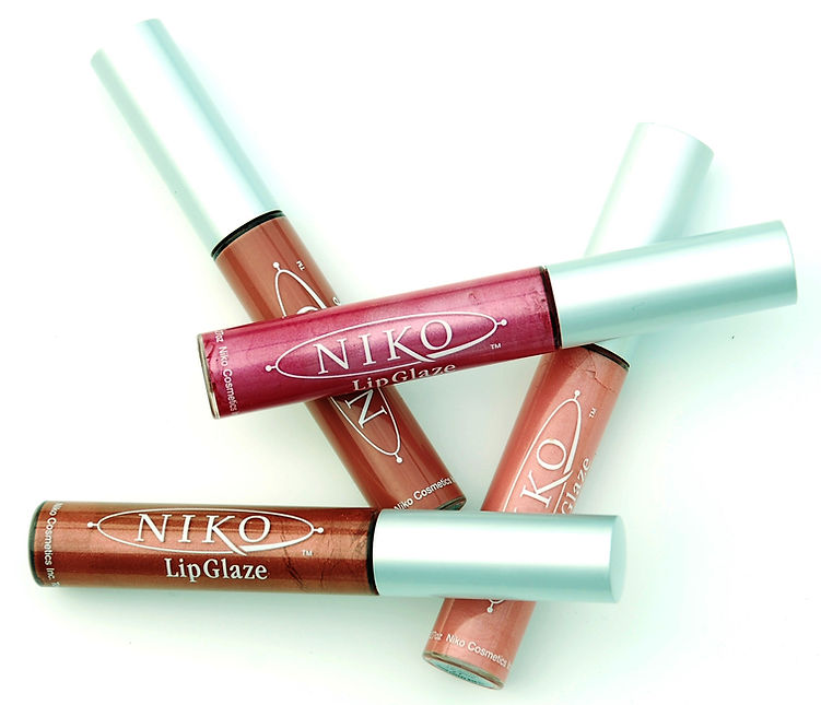 image of 4 NIKO Lipglazes arranged in an overlapping products cluster