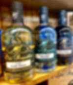 Eye-level view of premium bottles of whiskey on a shelf