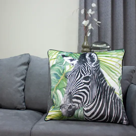 large zebra cushion on sofa