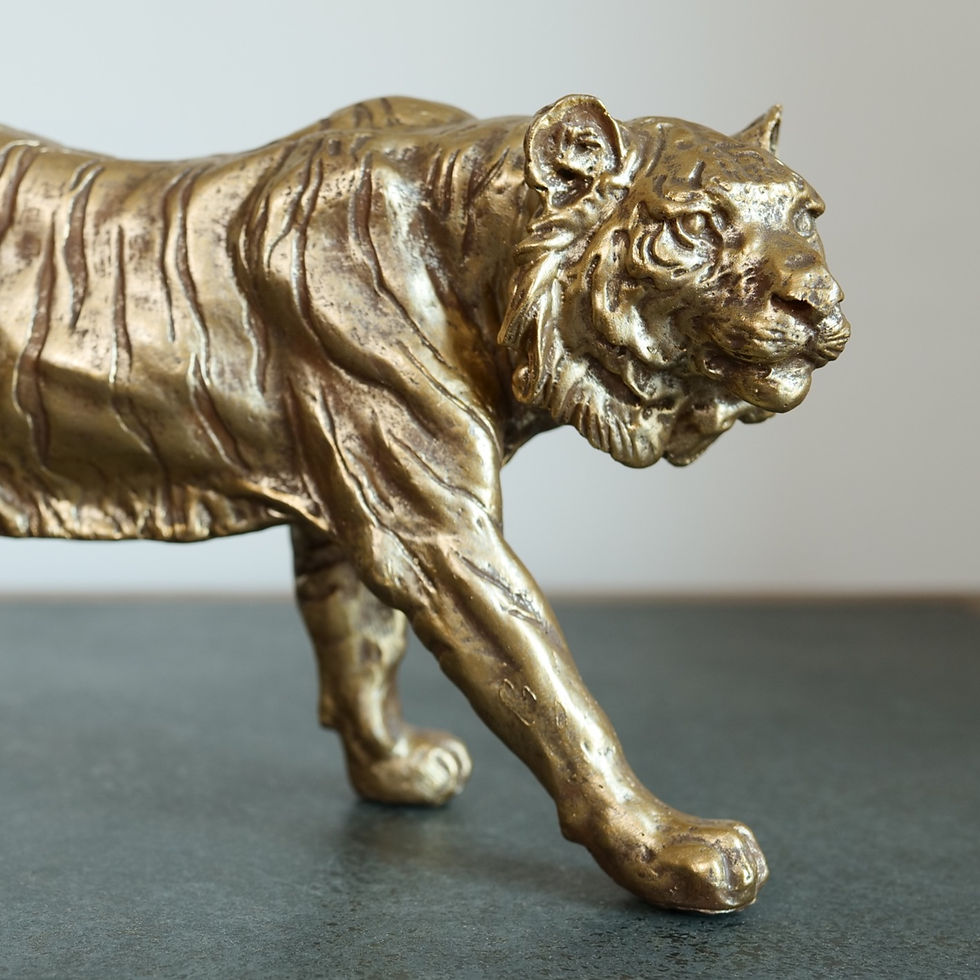 head of gold prowling tiger ornament