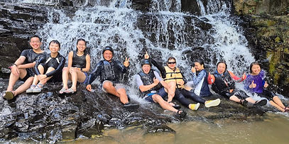 Group photo on the low rafting waterfall