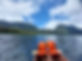 Boat on serene lake near Mount Kerinci