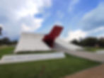 The outside of audotorio building, white with a red door, in Ibirapuera Park