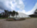 The outside of the Oca, a white dome-shaped buildings with holes around the sides, resembling a UFO