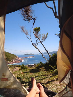 View over the ocean from inside a tent at Vale da Utopia