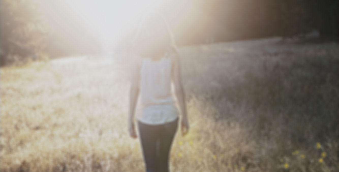 a person walking in a field